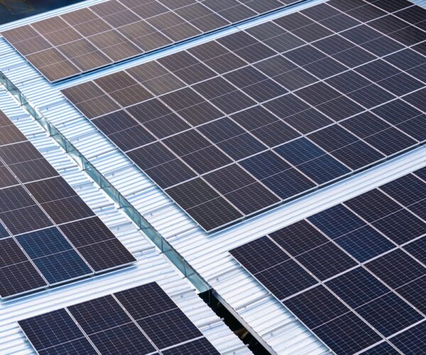 Solar panel on garage roof, Photovoltaic solar cell eco technolo Commercial Solar PV System